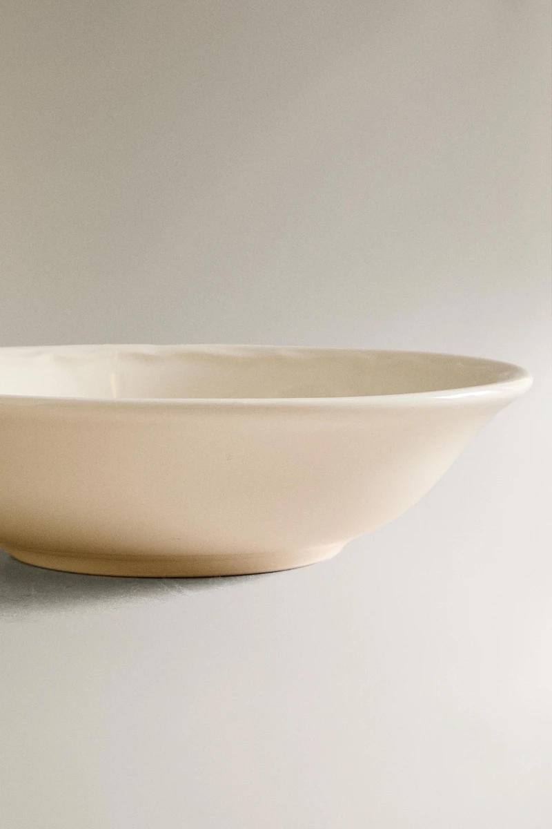 EARTHENWARE BOWL WITH RAISED-DESIGN EDGE