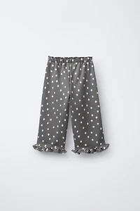 PANTALON EN MOLLETON IMPRIMÉ À VOLANTS