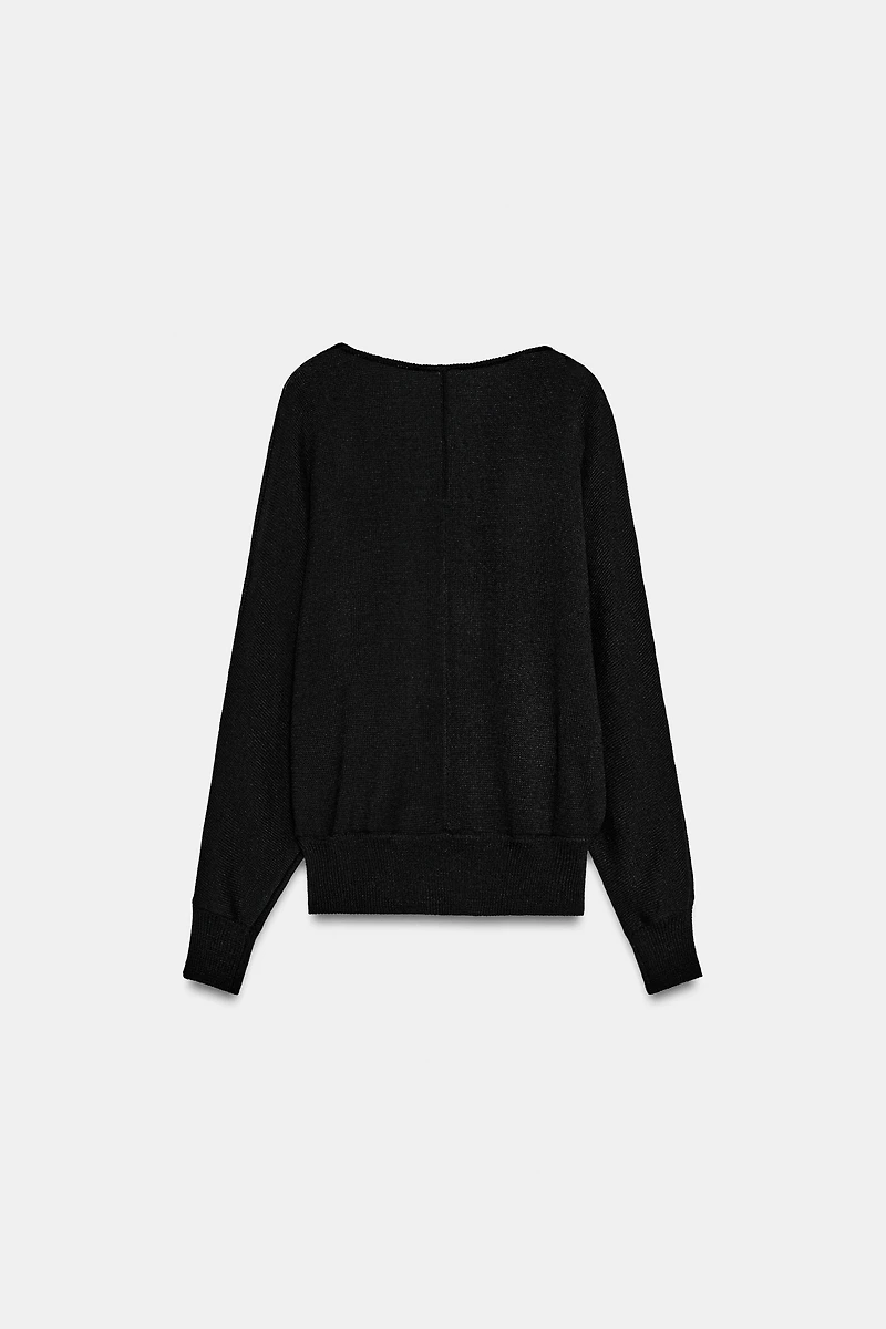 PULL EN MAILLE À COL V
