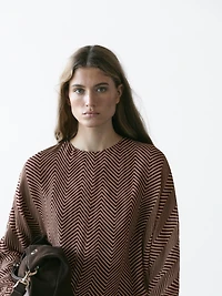 Flowing geometric print blouse