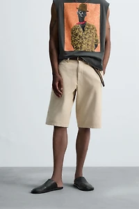 BAGGY FIT BERMUDA SHORTS © OTIS KWAME KYE QUAICOE