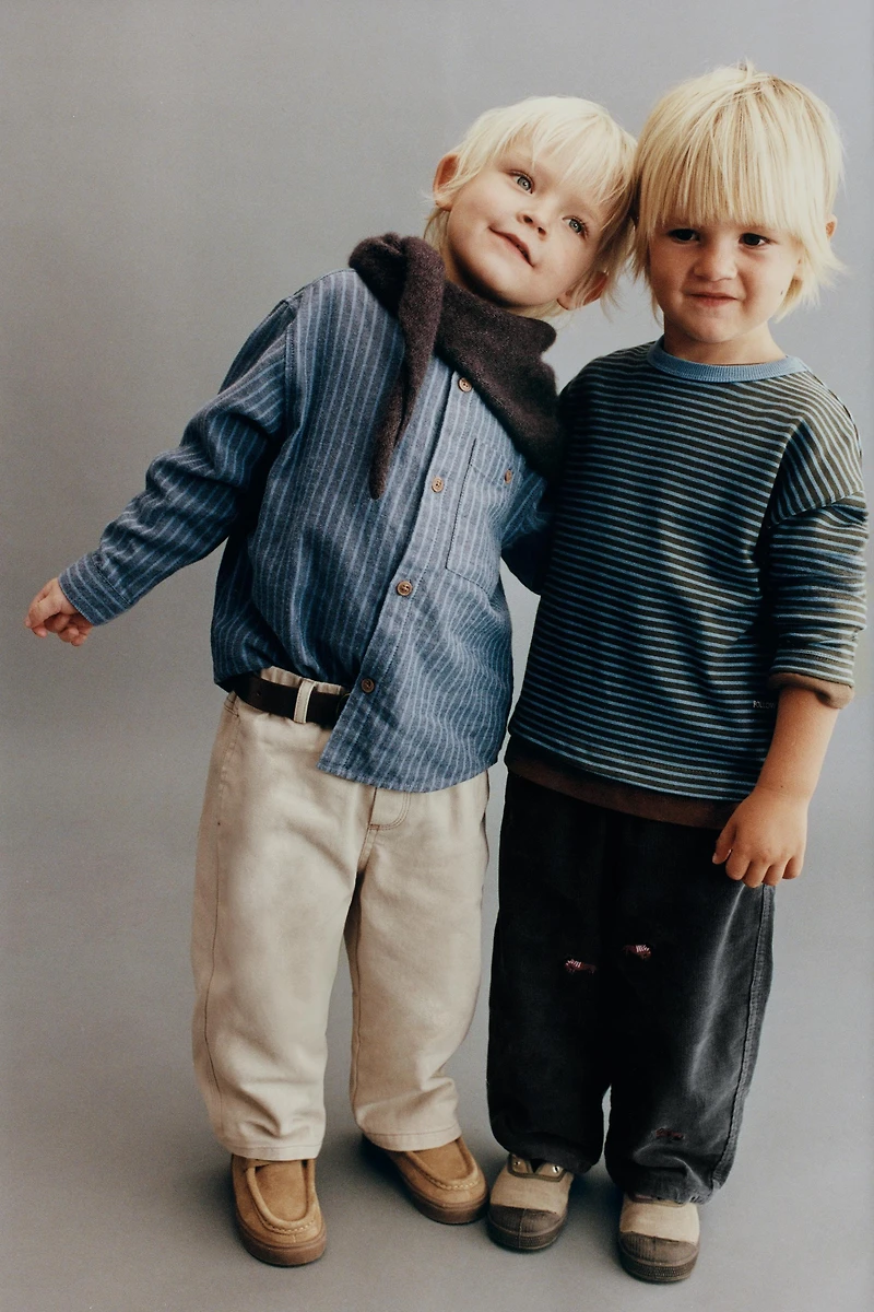 PANTALON EN VELOURS CÔTELÉ FIN DOUBLÉ BRODERIES