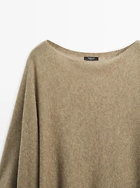 100% wool asymmetric knit cape