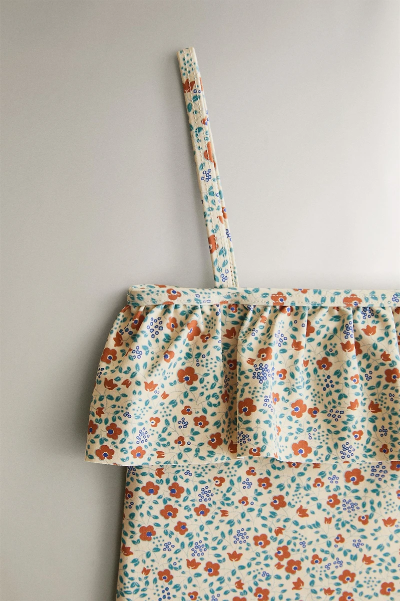 KIDS’ FLORAL RUFFLE BEACH SWIMSUIT