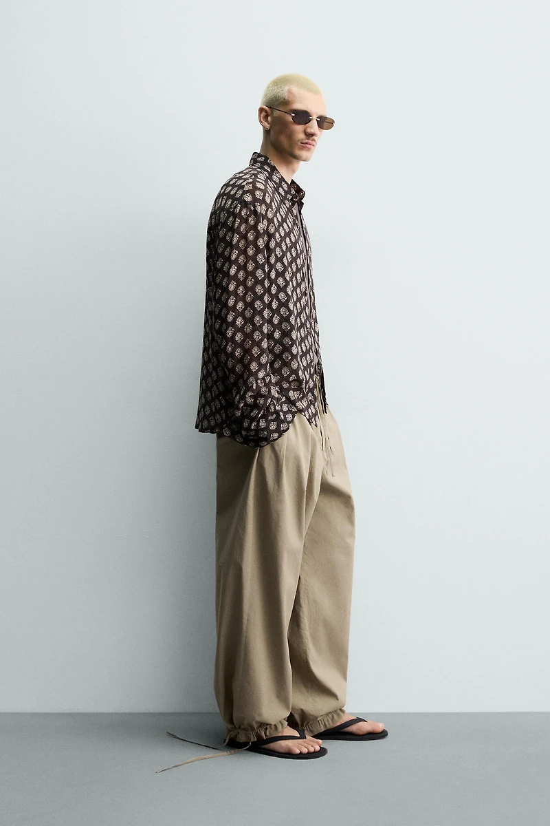 BALLOON FIT PLEATED PANTS