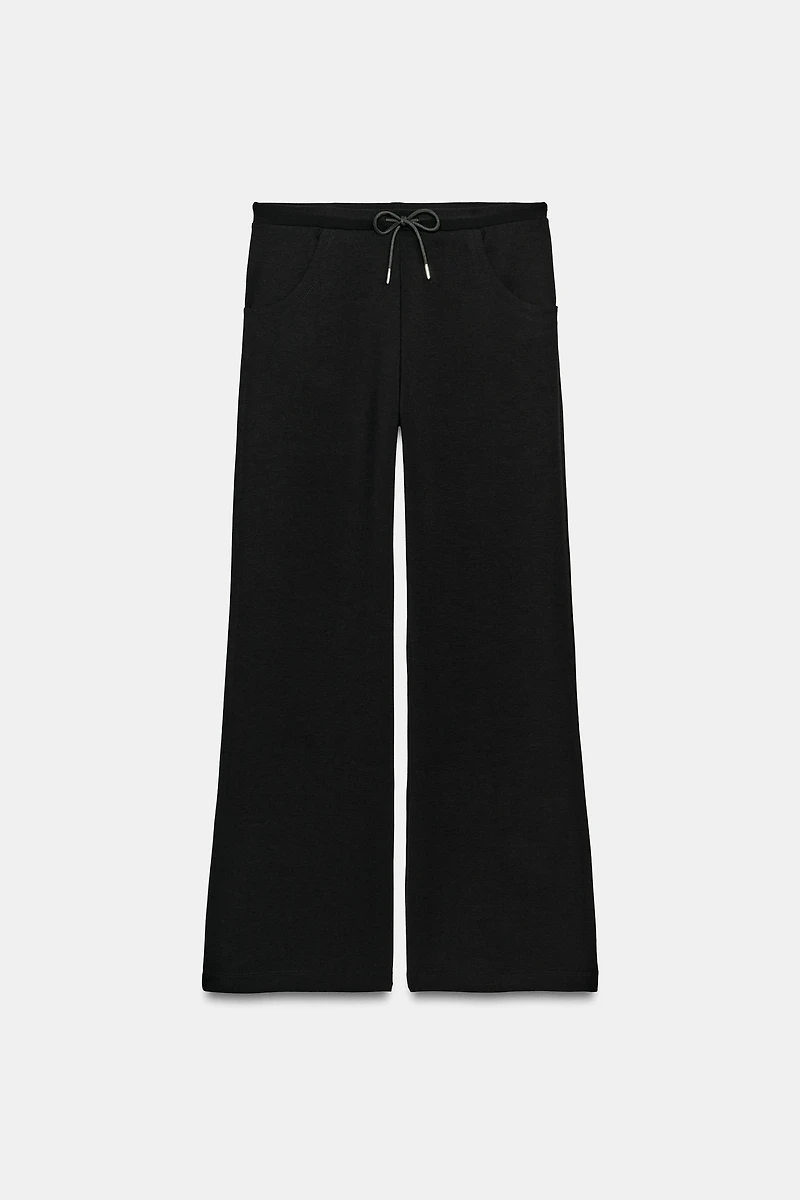 INTERLOCK FLARED PANTS