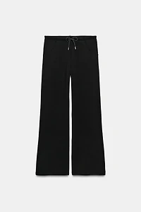 INTERLOCK FLARED PANTS