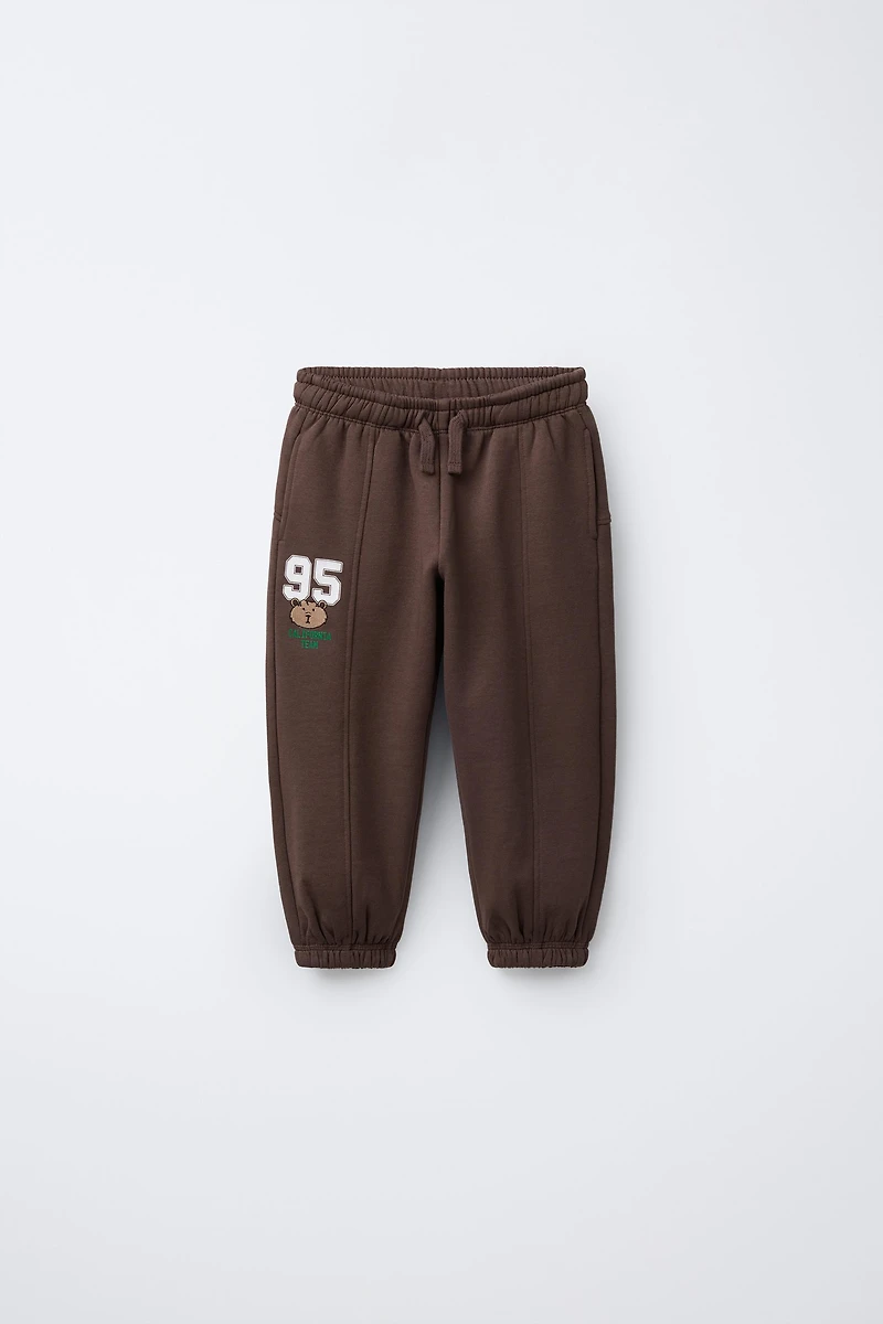 EMBROIDERED ANIMAL NUMBER JOGGING PANTS