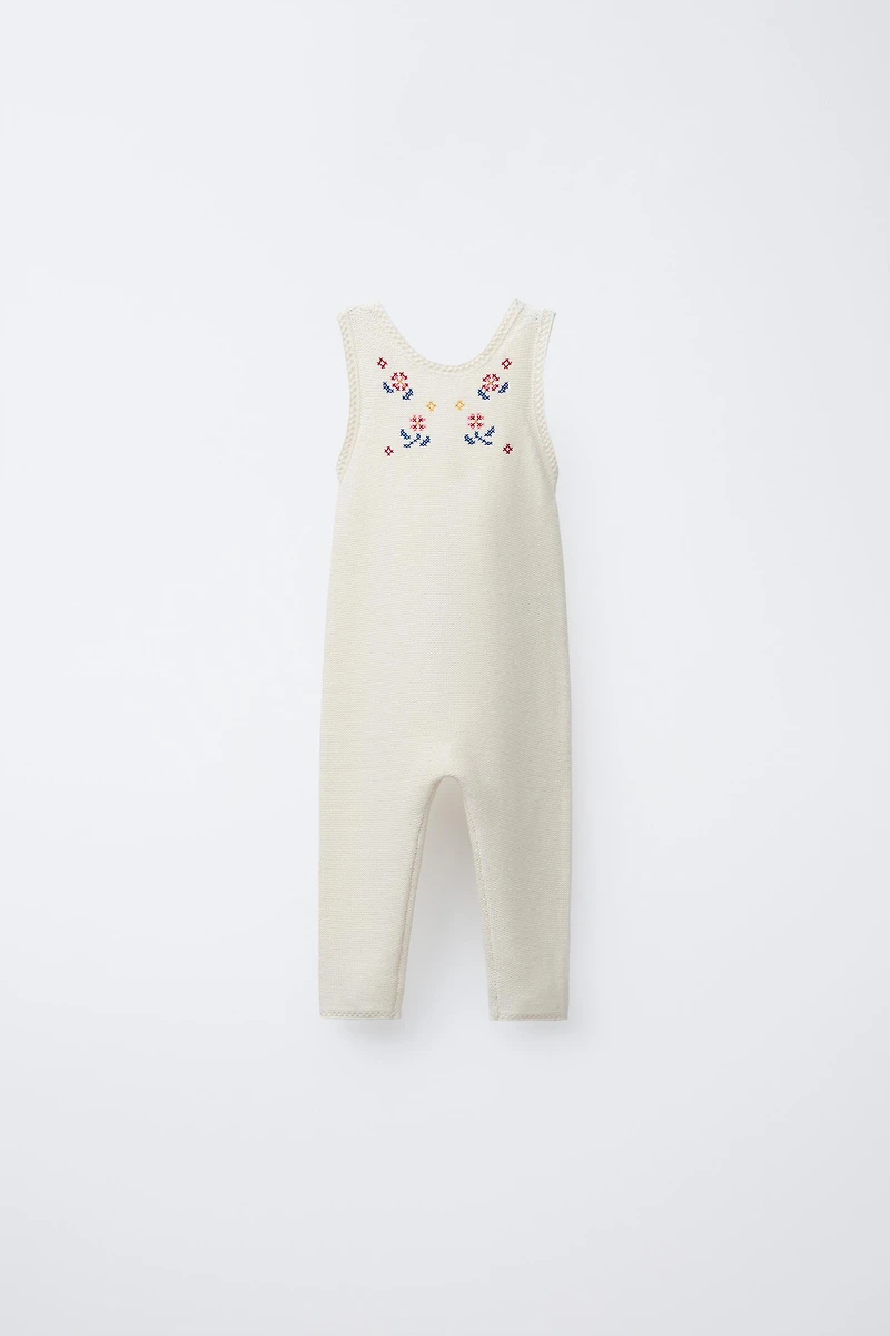 LONG KNIT OVERALLS WITH CROSS-STITCH DETAILS