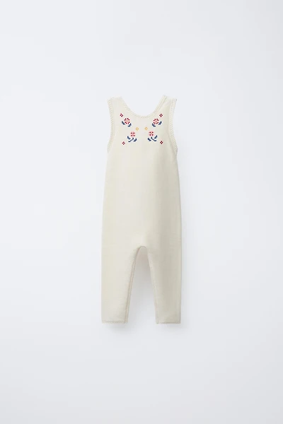 LONG KNIT OVERALLS WITH CROSS-STITCH DETAILS