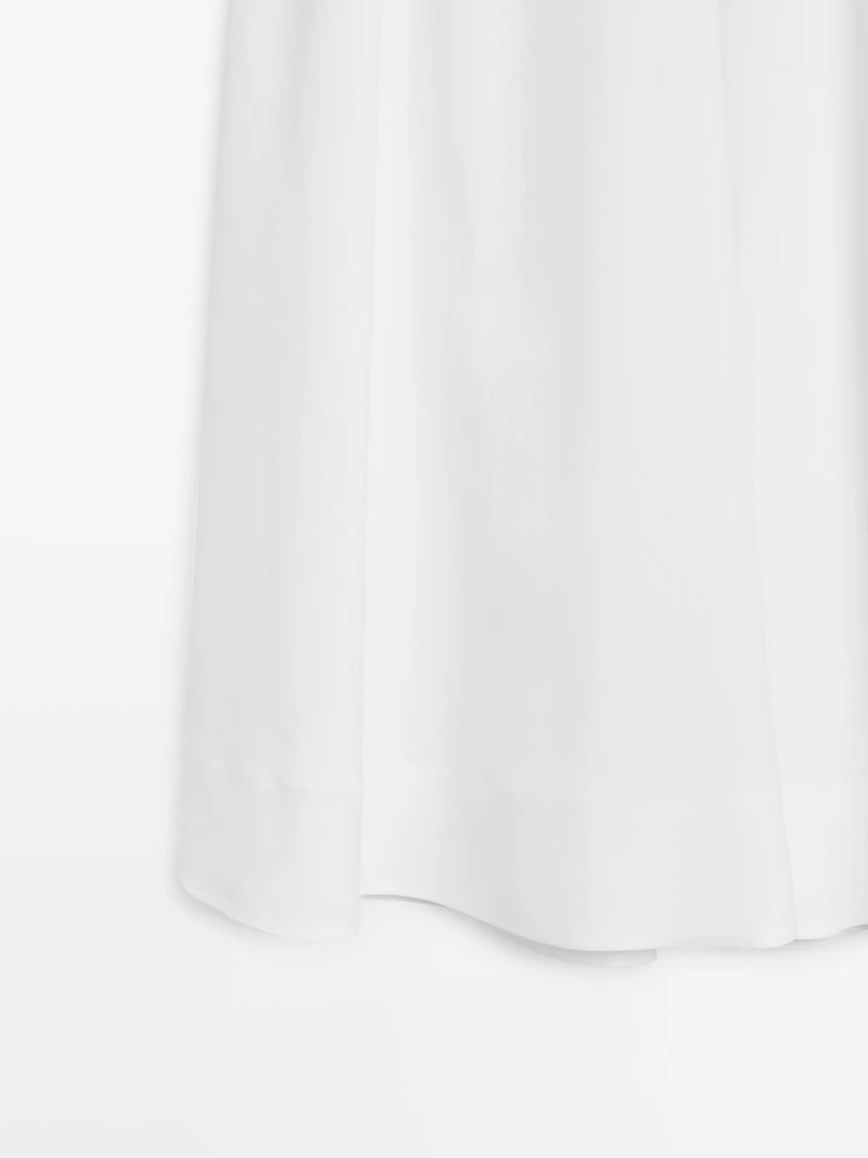 Flowing midi skirt with elastic detail