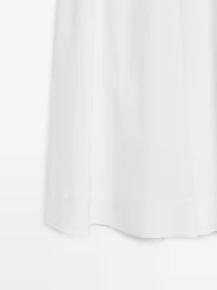 Flowing midi skirt with elastic detail