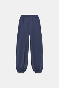PANTALON DE JOGGING DÉLAVÉ AVEC CLOUS