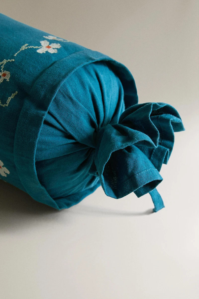 EMBROIDERED FLORAL BOLSTER PILLOW