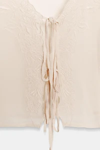 EMBROIDERED TIE TOP