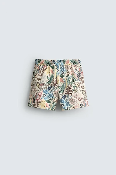 LONG FLORAL PRINT SWIM TRUNKS