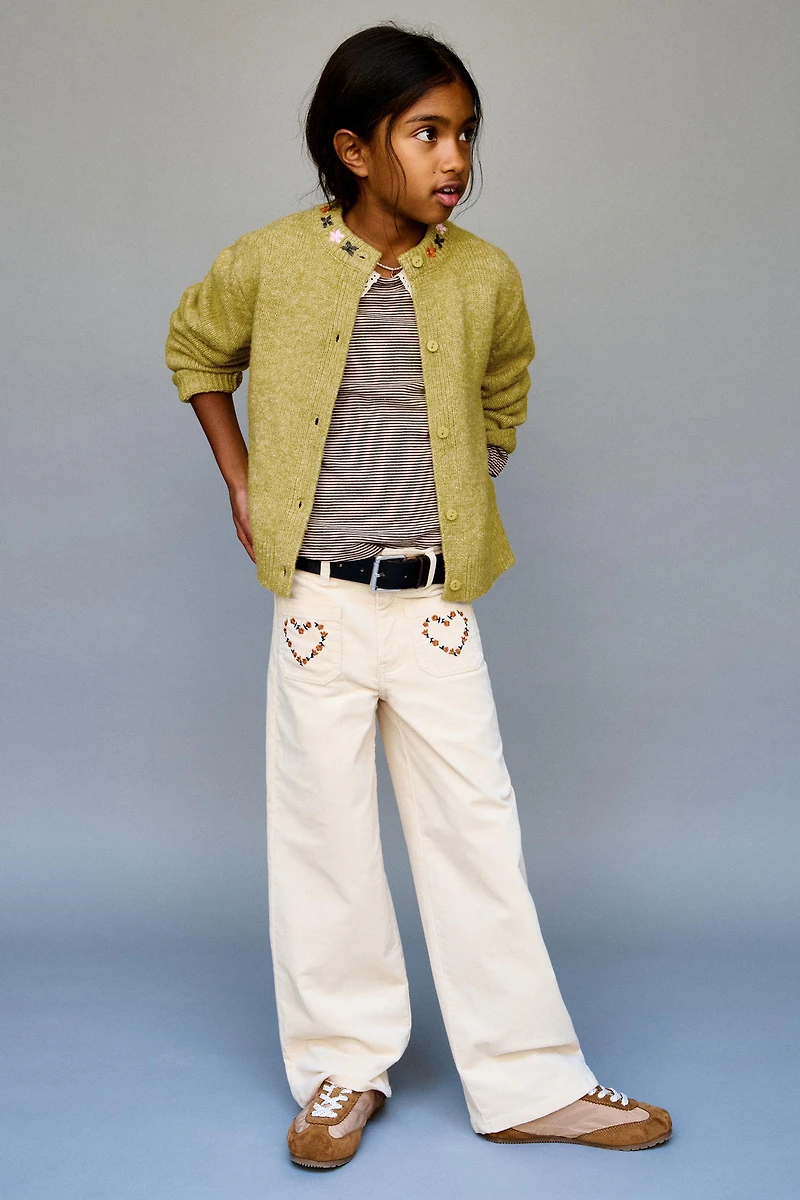 GILET EN MAILLE À FLEURS BRODÉES