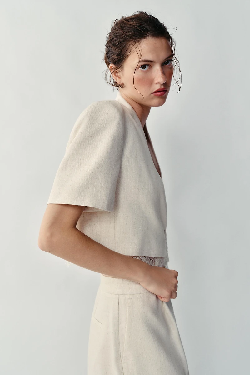 VESTE COURTE À BORDURE DENTELLE