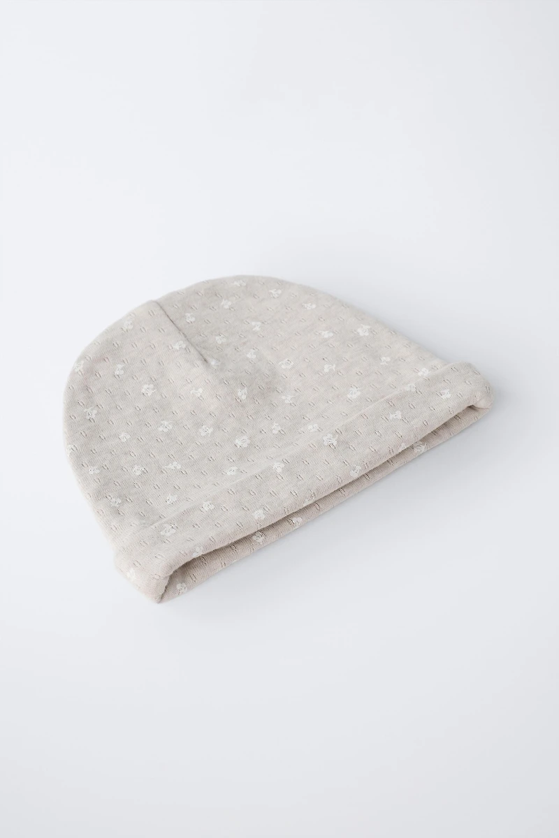TWO-PIECE PRINTED TEXTURED HAT AND BIB SET