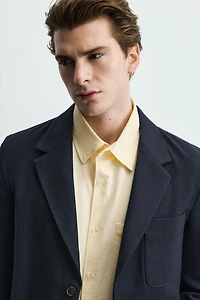 VESTE À POCHES AVEC LAINE
