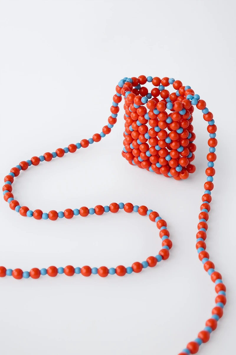 LONG BEADED NECKLACE