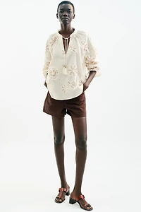 TEXTURED EMBROIDERED BLOUSE