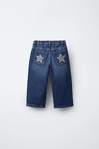 STRAIGHT JEANS WITH STAR ANIMAL PRINT PATCHES
