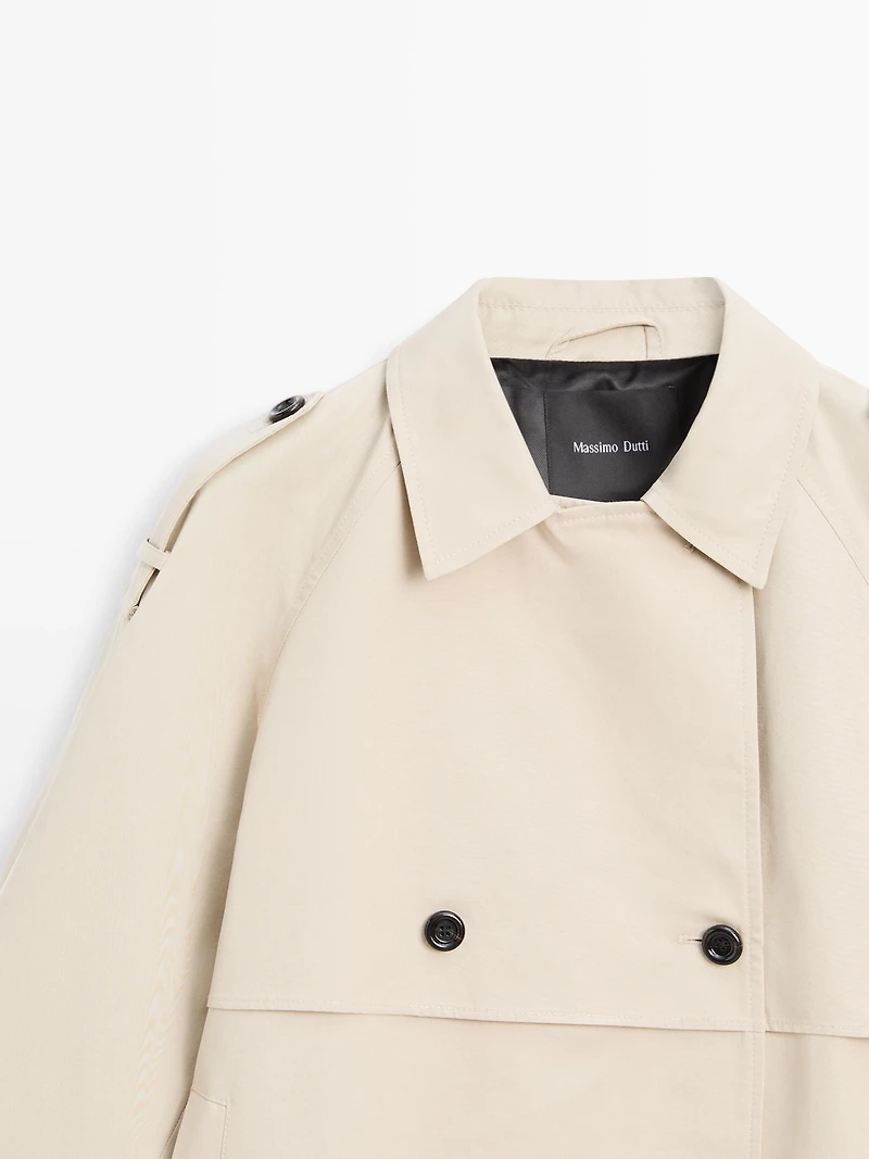 Short trench coat with belt detail