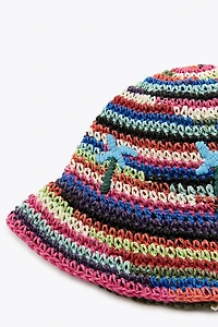 MULTICOLORED BRAIDED BUCKET HAT