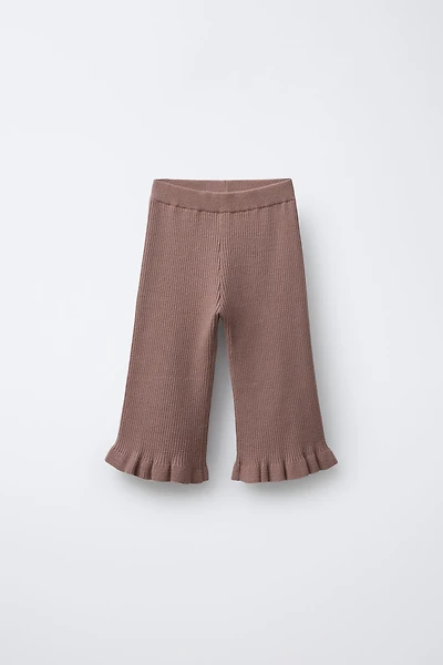 PANTALON EN MAILLE AVEC VOLANTS
