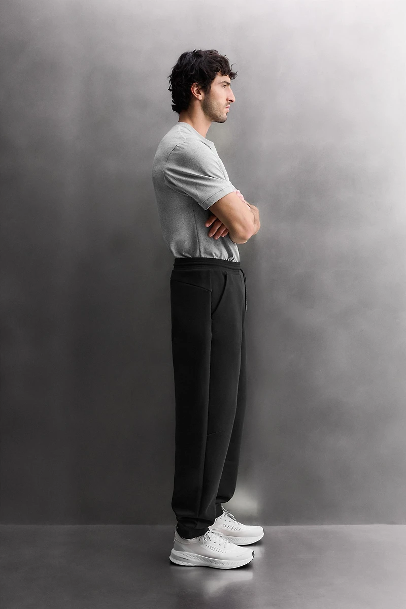 TECHNICAL PANTS WITH ZIPPERS