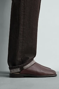 SABOTS EN CUIR
