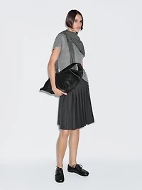 Jupe courte plissée taille large