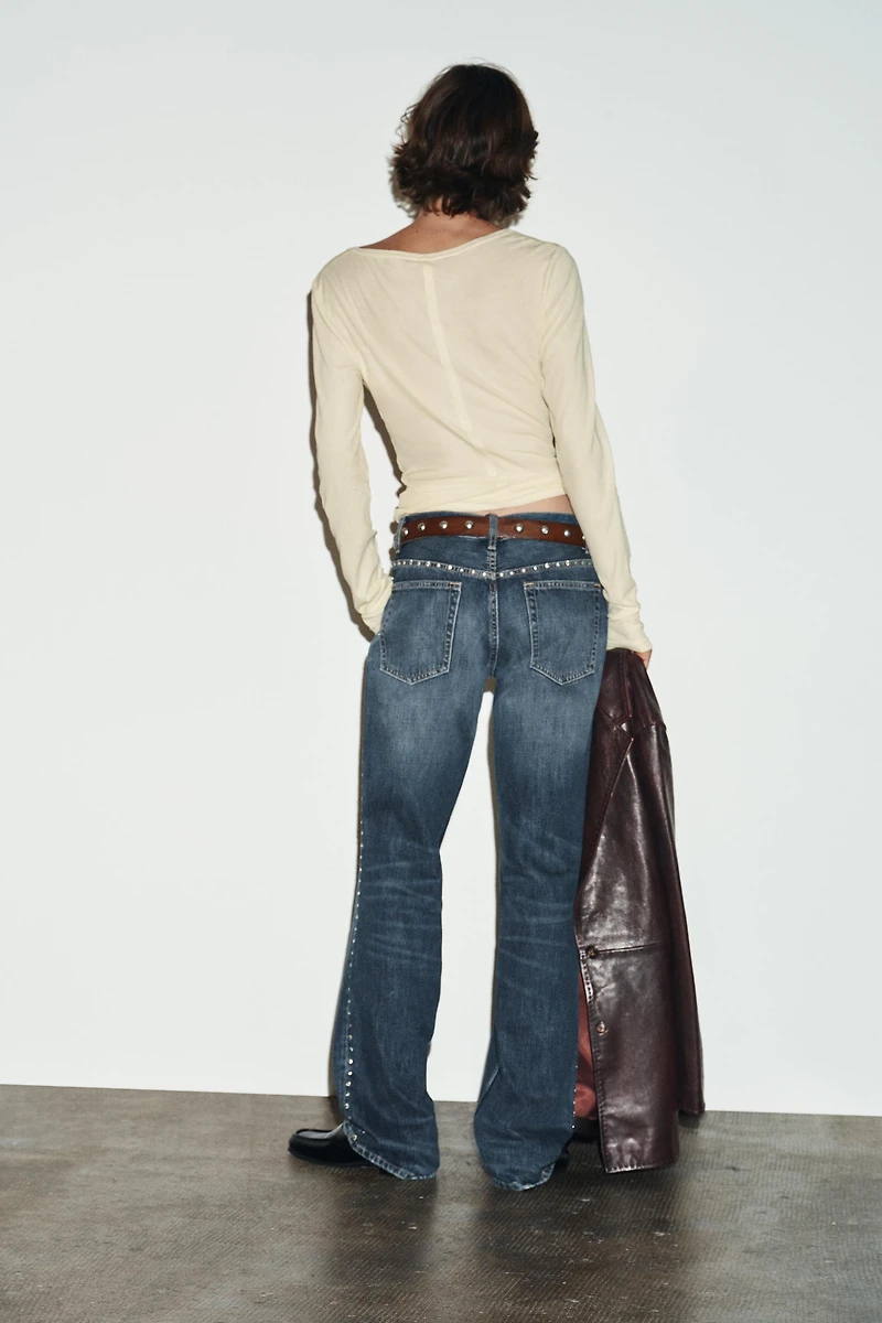 TRF SLUNG LOW-RISE STUDDED JEANS