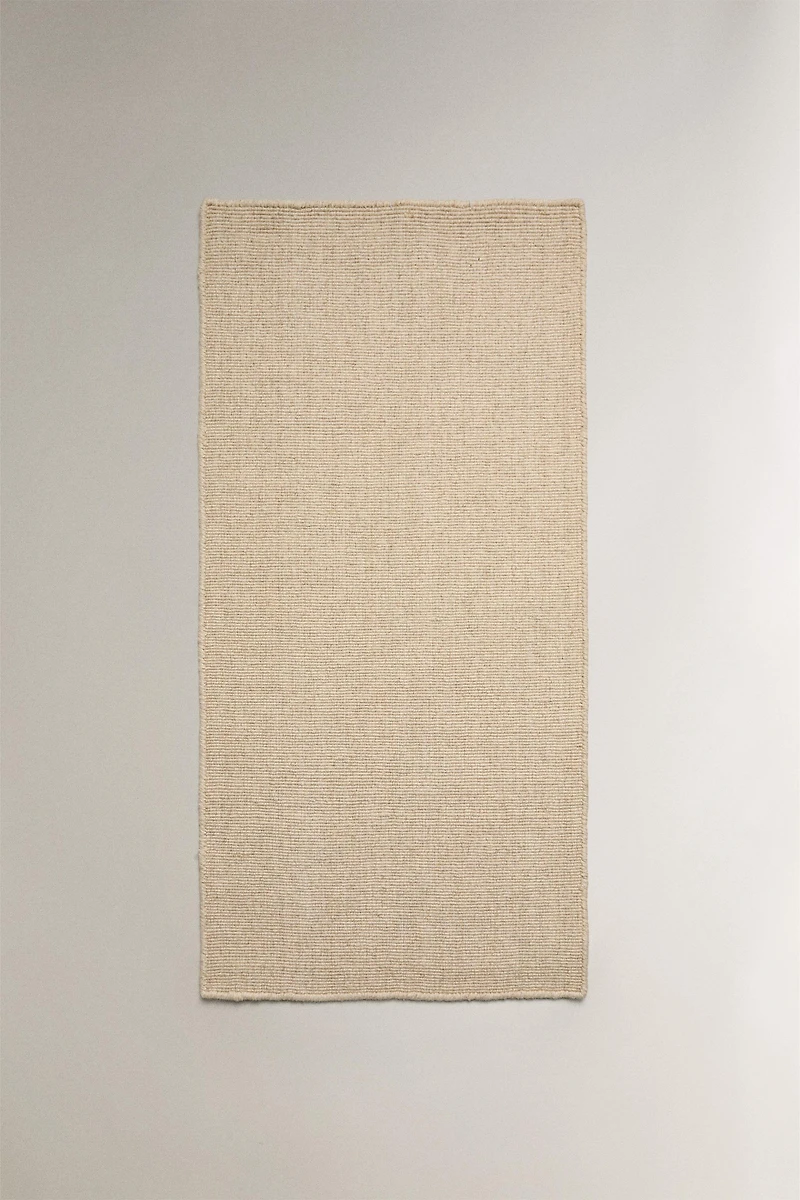 WOOL AREA RUG WITH SCALLOPED LINES