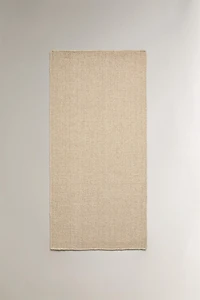 WOOL AREA RUG WITH SCALLOPED LINES