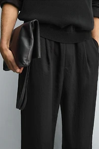 FLOWY PLEATED PANTS