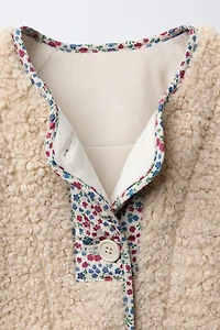 FLEECE JACKET WITH FLORAL TRIM