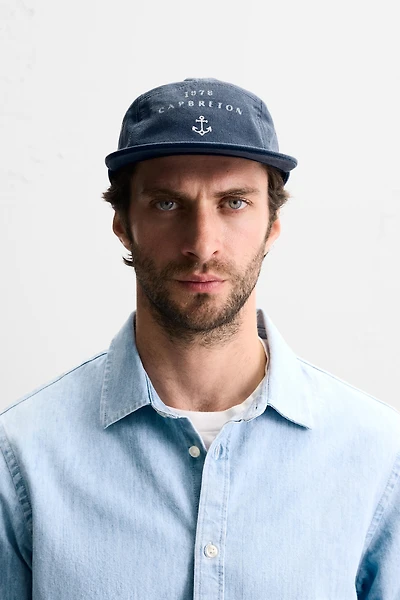 CASQUETTE DÉLAVÉE À IMPRIMÉ COMBINÉ