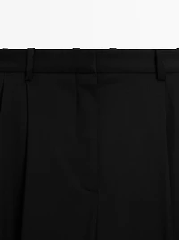 100% extra fine wool pleated trousers