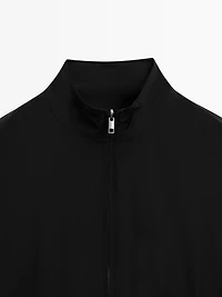 Veste réversible à col montant