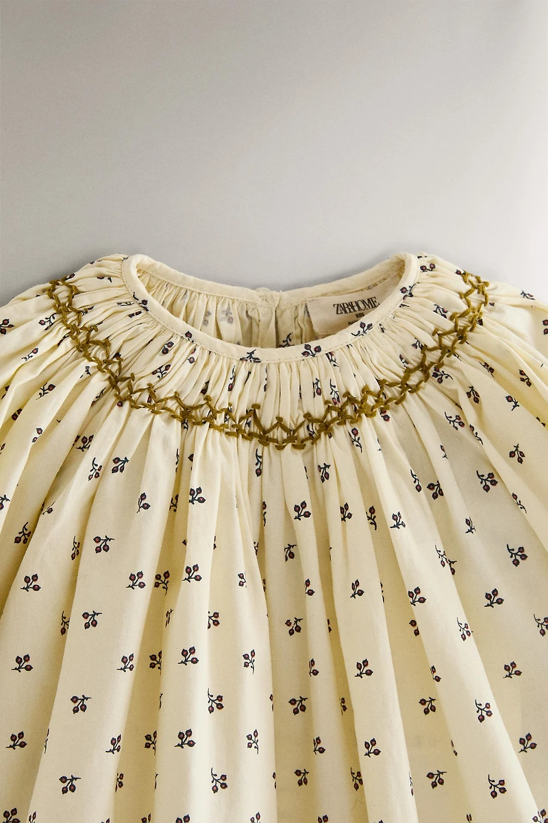 GATHERED FLORAL BABY ROMPER