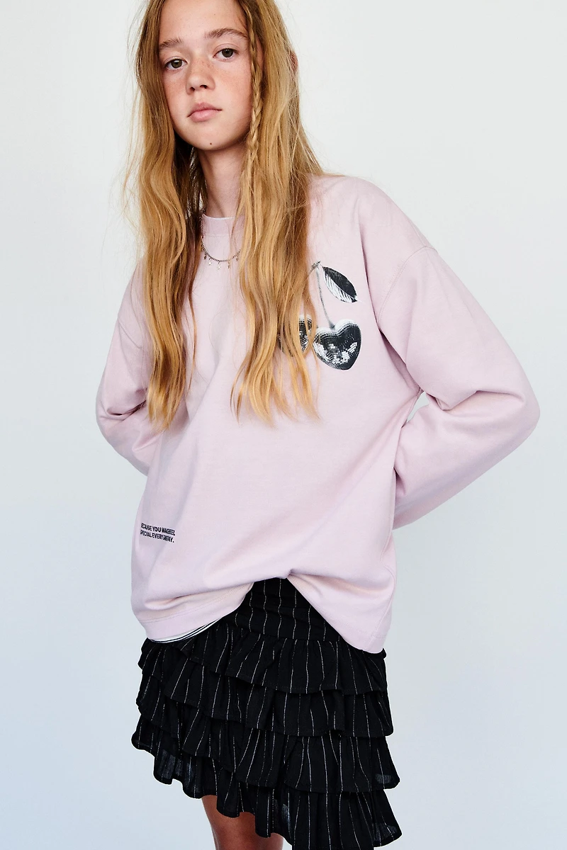 JUPE-SHORT À RAYURES BRILLANTES
