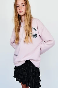 JUPE-SHORT À RAYURES BRILLANTES