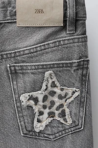 ANIMAL PRINT STAR WIDE LEG JEANS