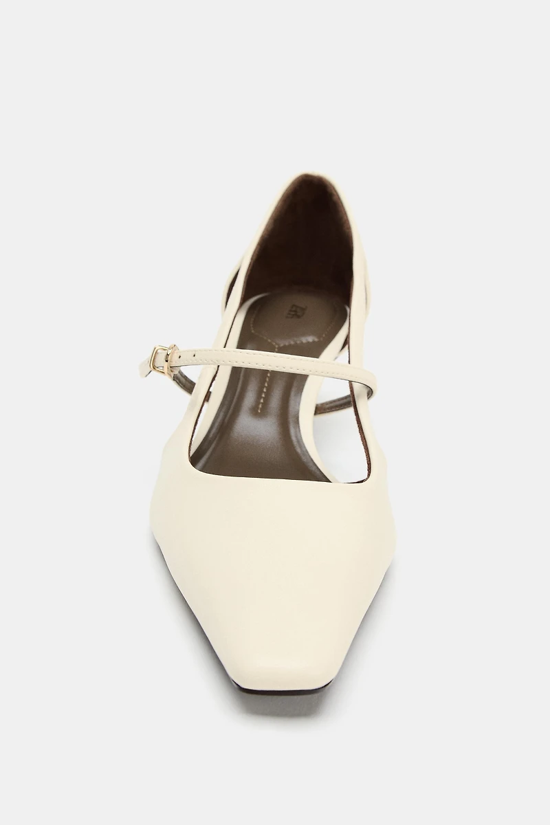 HEELS WITH SIDE CUT-OUTS