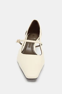 HEELS WITH SIDE CUT-OUTS