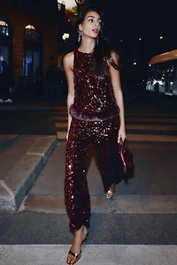 SEQUIN TOP WITH FAUX FUR HEM