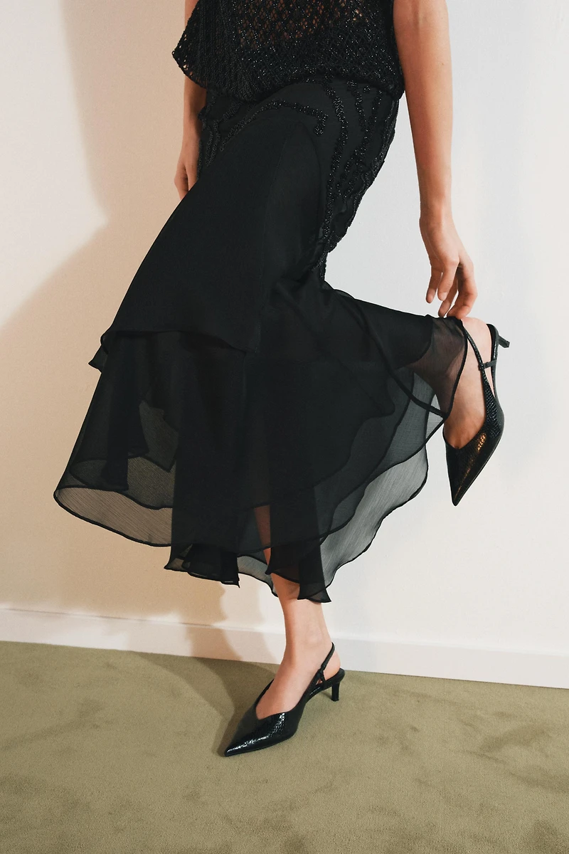 JUPE MI-LONGUE À VOLANTS ET FANTAISIE