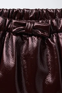BOW PATENT LEATHER SKORT